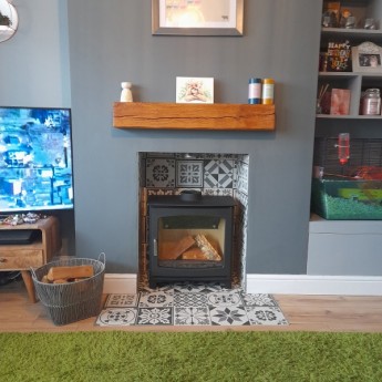 5kw-Eco-Design-Stove-Slimline-Panoramic-in-tiled-fireplace1650988446.jpg
