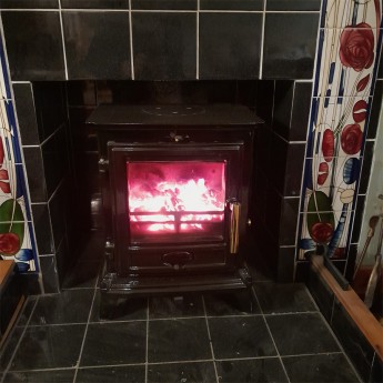 Black-Enamel-Ecosy-Rock-Compact-cast-iron-multi-fuel-stove1740142800.jpg