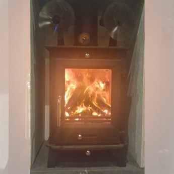 DEFRA-APPROVED-Ottawa-5kw-Contemporary-Wood-burning-Stove1706625934.jpg